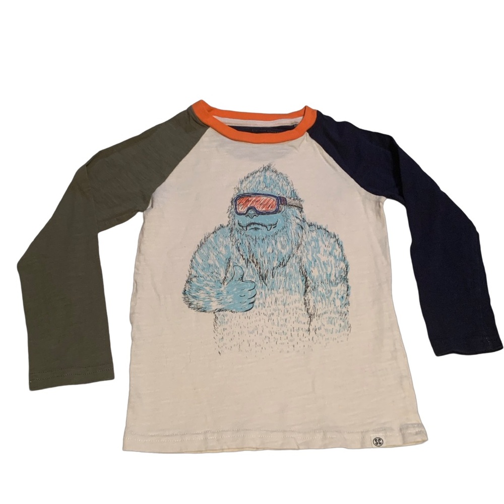 Yeti, wearing goggles five long sleeve shirt